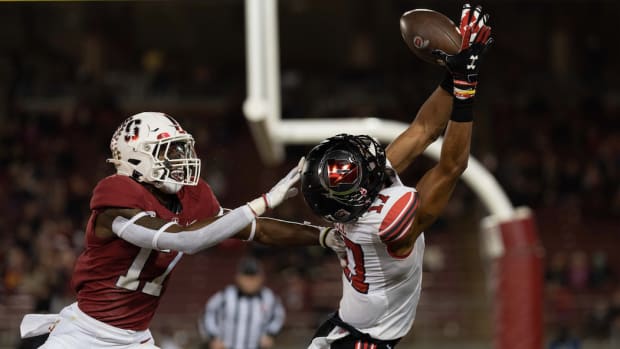 Nov 5, 2021; Stanford, California, USA; Stanford Cardinal cornerback Kyu Blu Kelly (17) attempts to defend against Utah Utes wide receiver Devaughn Vele (17) during the first quarter at Stanford Stadium.